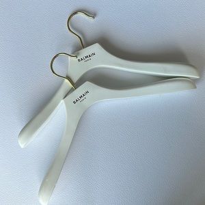 Two wooden Balmain hangers